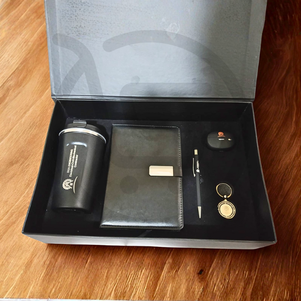 Luxury New Dawn corporate gift box with tumbler, notebook, pen, keychain, and earbuds – perfect New Year business gifts by Shop Carlo.