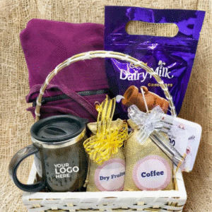 Cozy corporate New Year gift basket with hoodie, coffee mug, chocolates, coffee pouch, dry fruits, and greeting card – perfect for employees and clients.