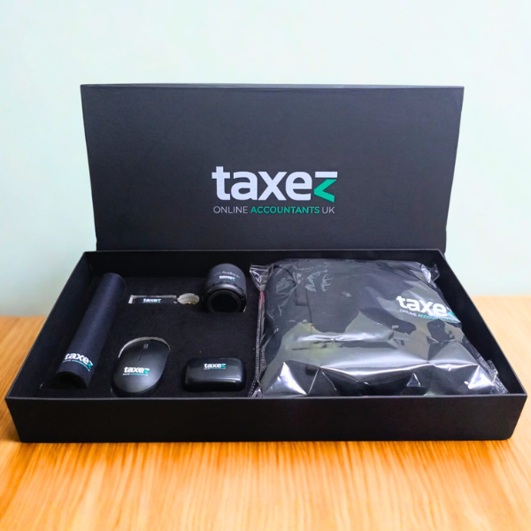 Office essentials corporate gift box with hoodie, wireless mouse, earbuds, speaker and accessories in premium packaging